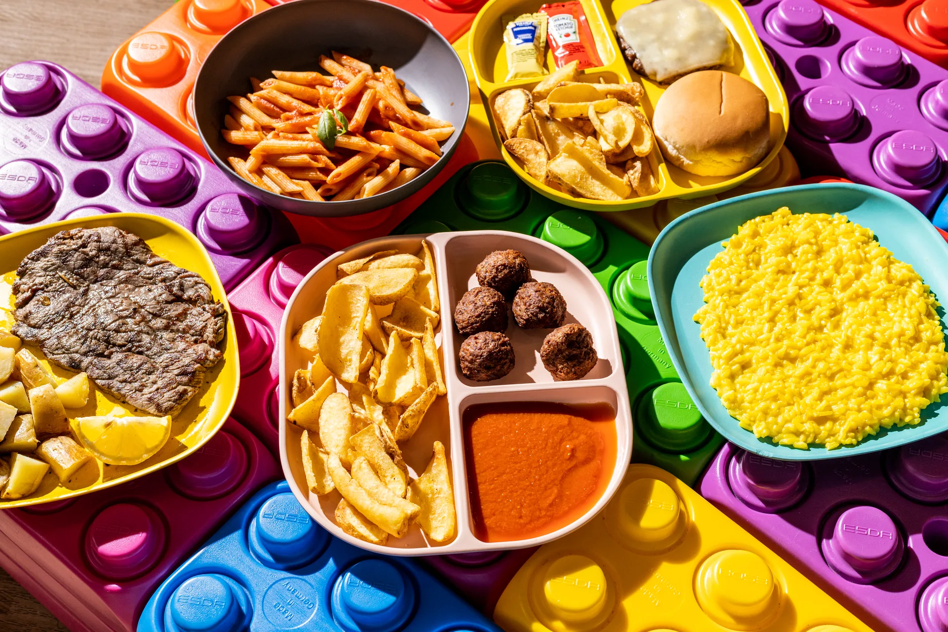 Piatti del menù bambini Benvenuto, tra pasta, burger e patatine